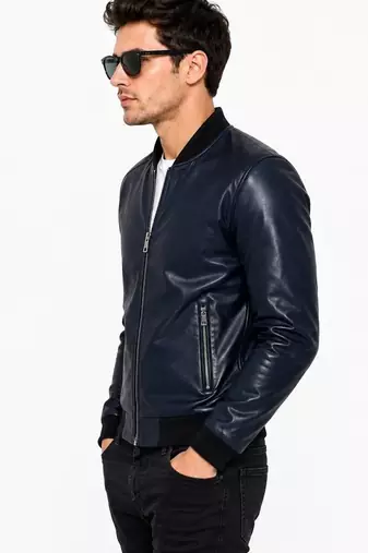 Men's navy blue leather bomber jacket tailored look