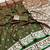 Green soft silk blend saree with zari weaving meenakari design