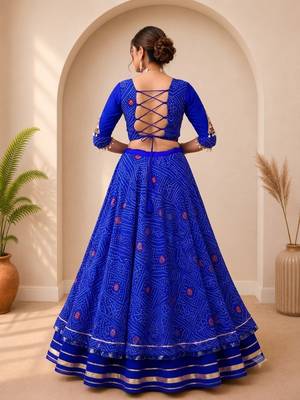  Blue Bandhej Flared Lehenga and Short Kurta Set with Mirror Work Jacket 3