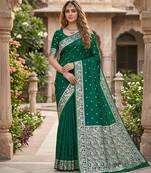 Green soft silk blend saree with zari weaving meenakari design