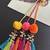 Handmade multicolored boho pompom parandi