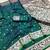 Green soft silk blend saree with zari weaving meenakari design