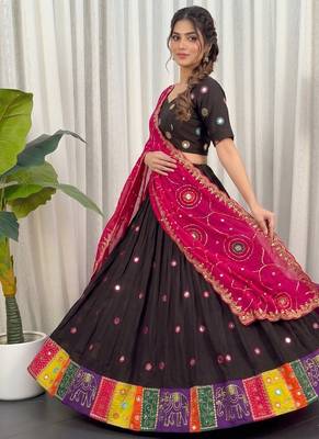 Traditional Black Navratri Lehenga Choli with Mirror Work and Contrast Rani Pink Dupatta 1