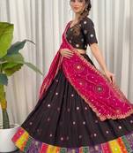 Traditional Black Navratri Lehenga Choli with Mirror Work and Contrast Rani Pink Dupatta