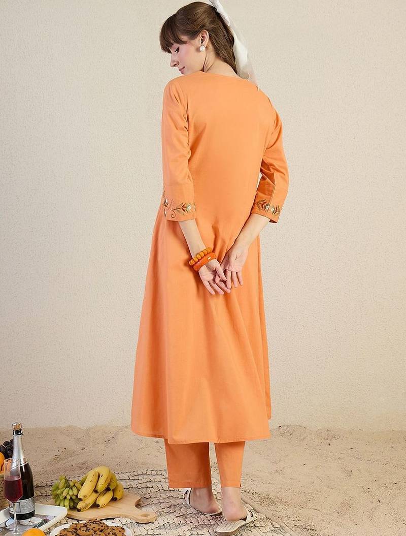 Women Floral Embroidered Cotton Kurta with Trousers