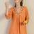Women Floral Embroidered Cotton Kurta with Trousers