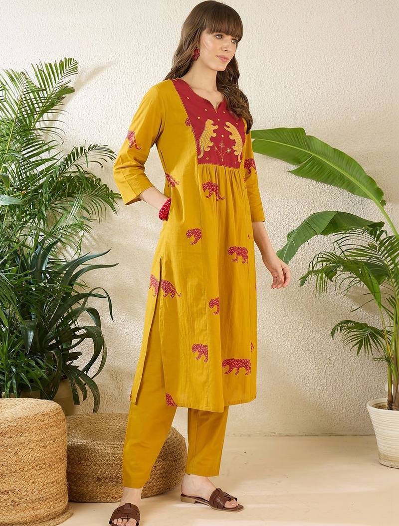 Women Animal Printed Empire Thread Work Cotton Kurta with Trousers