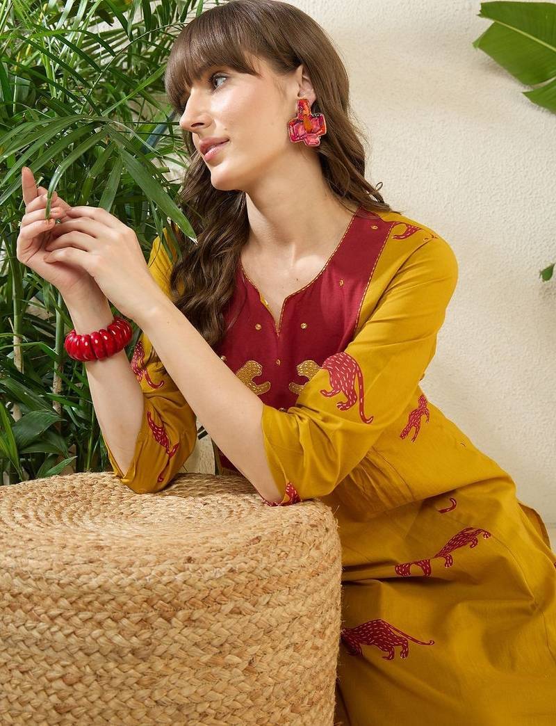 Women Animal Printed Empire Thread Work Cotton Kurta with Trousers