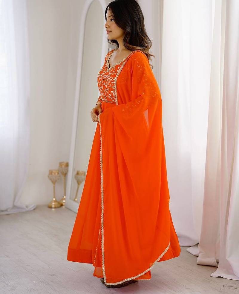 Orange sequins embroidered georgette gown with pant & dupatta