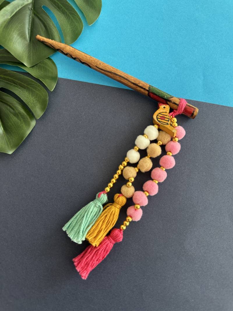 Multicolored handmade pompom bunstick