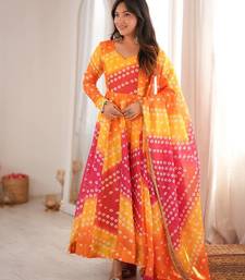 Orange bandhani printed maslin anarkali suit set with dupatta