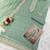 Light teal heavy orgenza with embroidery straight salwar suit