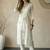 Women Floral Embroidered Thread Work Kurta with Trousers