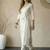 Women Floral Embroidered Thread Work Kurta with Trousers