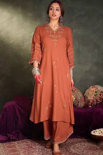 Women Ethnic Motifs Embroidered Thread Work Kurta with Palazzos