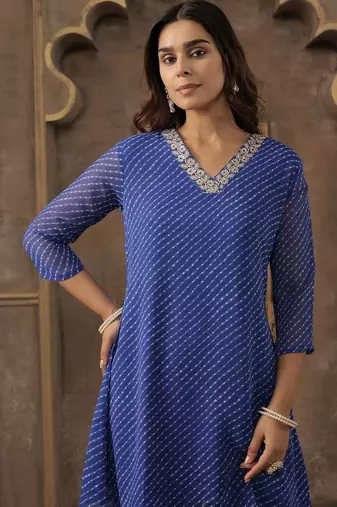 Women Ethnic Motifs Printed Thread Work Kurta with Trousers
