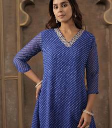 Women Ethnic Motifs Printed Thread Work Kurta with Trousers