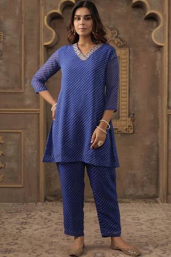 Women Ethnic Motifs Printed Thread Work Kurta with Trousers