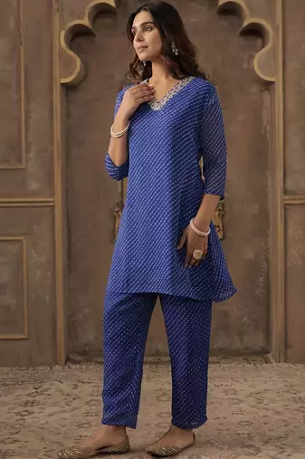 Women Ethnic Motifs Printed Thread Work Kurta with Trousers