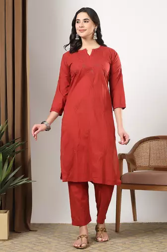 Women red ethnic motifs embroidered chikankari mukaish work cotton ethnic kurta palazzo set