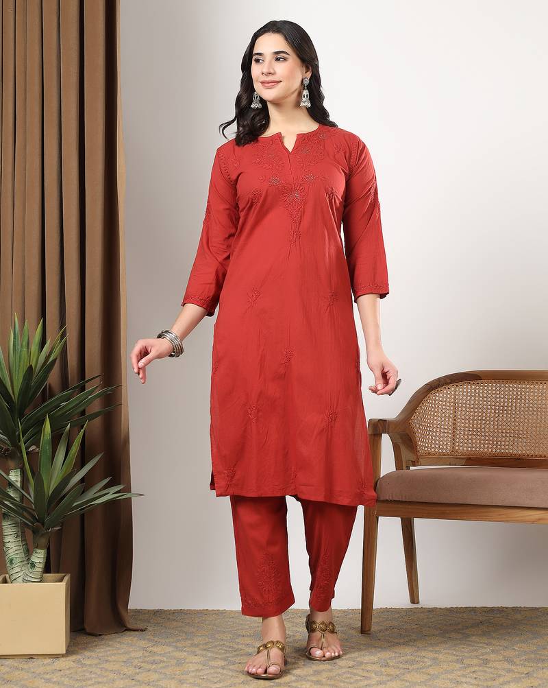 Women red ethnic motifs embroidered chikankari mukaish work cotton ethnic kurta palazzo set
