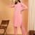 Women peach ethnic motifs embroidered chikankari mukaish work cotton ethnic kurta palazzo set