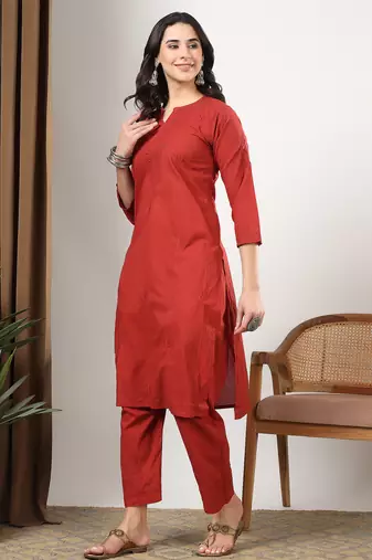Women red ethnic motifs embroidered chikankari mukaish work cotton ethnic kurta palazzo set