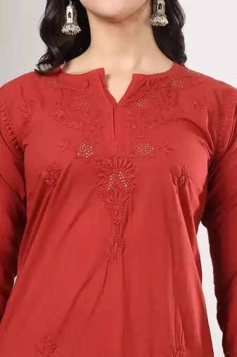 Women red ethnic motifs embroidered chikankari mukaish work cotton ethnic kurta palazzo set