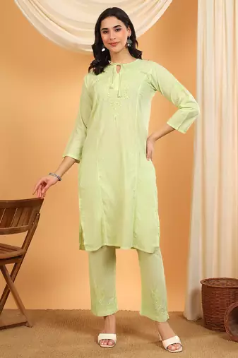 Women green ethnic motifs embroidered chikankari cotton tie up neck kurta palazzo set