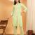 Women green ethnic motifs embroidered chikankari cotton tie up neck kurta palazzo set