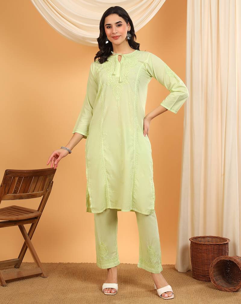 Women green ethnic motifs embroidered chikankari cotton tie up neck kurta palazzo set
