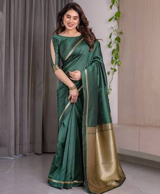 Green elegant zari woven banarasi silk sarees with attached blouse 2