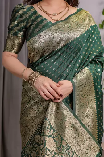 Green elegant zari woven banarasi silk sarees with attached blouse