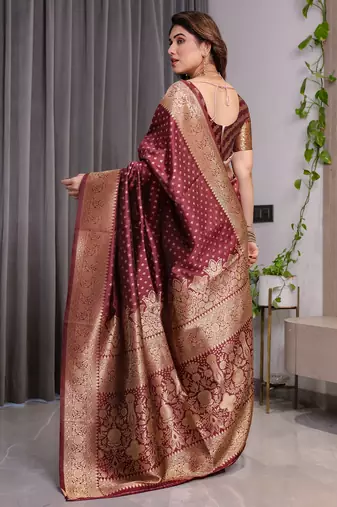 Maroon elegant zari woven banarasi silk sarees with attached blouse