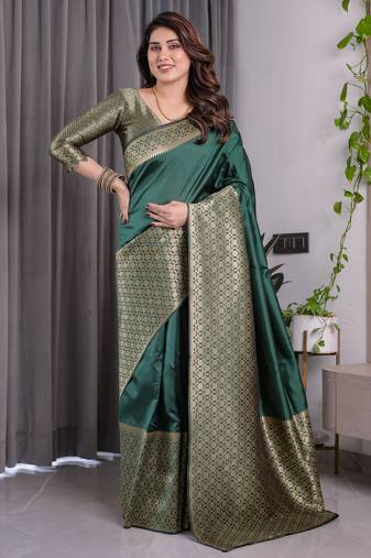Green elegant zari woven banarasi silk sarees with attached blouse