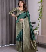 Green elegant zari woven banarasi silk sarees with attached blouse