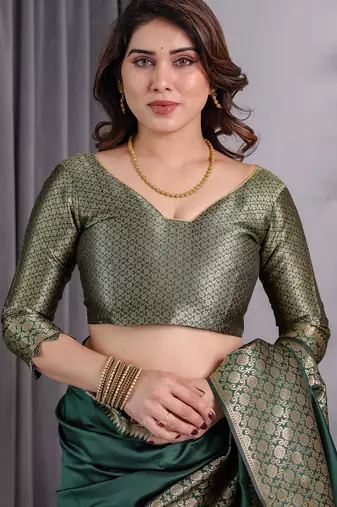Green elegant zari woven banarasi silk sarees with attached blouse