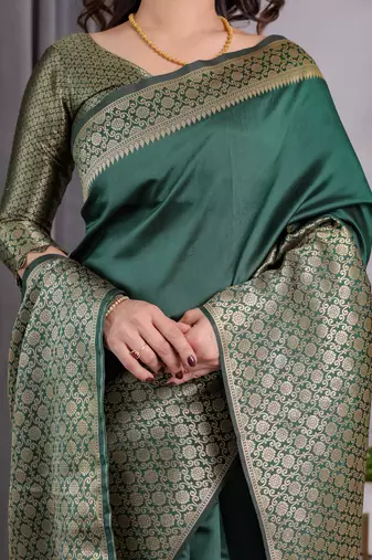 Green elegant zari woven banarasi silk sarees with attached blouse