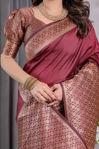 Maroon elegant zari woven banarasi silk sarees with attached blouse