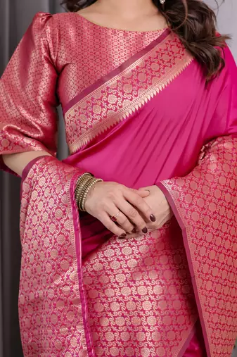 Pink elegant zari woven banarasi silk sarees with attached blouse