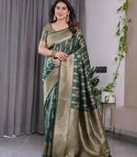 Green elegant zari woven banarasi silk sarees with attached blouse