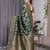 Green elegant zari woven banarasi silk sarees with attached blouse