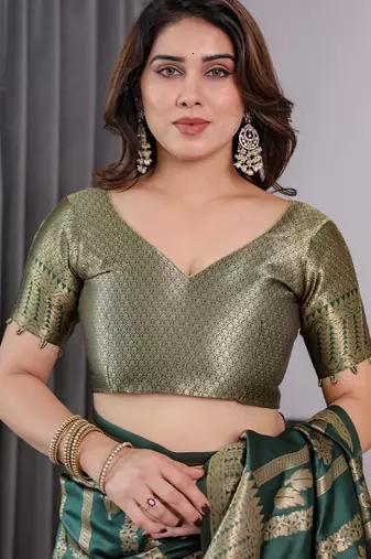 Green elegant zari woven banarasi silk sarees with attached blouse