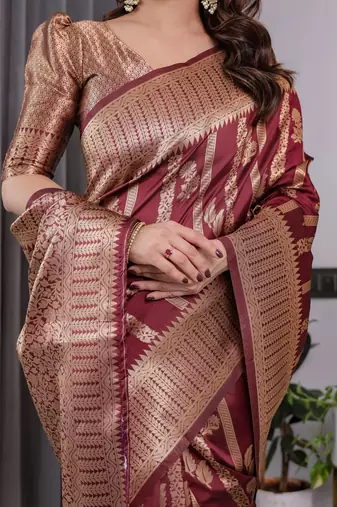 Maroon elegant zari woven banarasi silk sarees with attached blouse