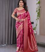 Pink elegant zari woven banarasi silk sarees with attached blouse