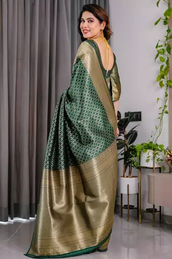 Green elegant zari woven banarasi silk sarees with attached blouse