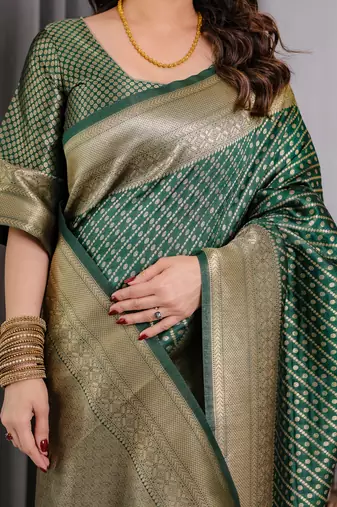 Green elegant zari woven banarasi silk sarees with attached blouse