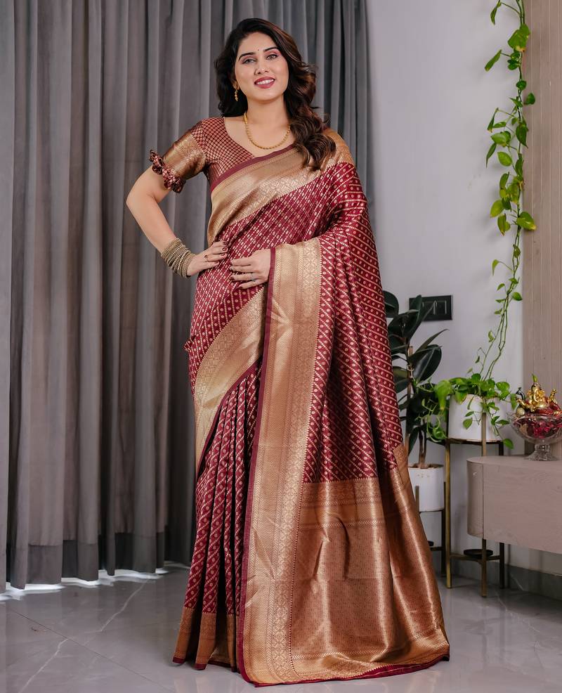 Maroon elegant zari woven banarasi silk sarees with attached blouse
