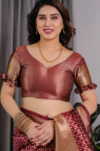 Maroon elegant zari woven banarasi silk sarees with attached blouse