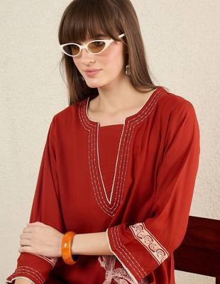 Women Ethnic Motifs Printed Thread Work Kurta with Palazzos 3